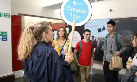 Campus tour guide during a campus tour for prospective students.
