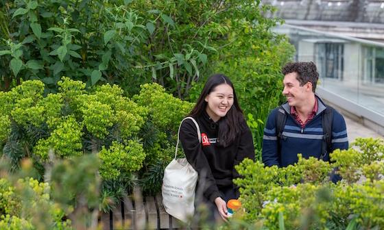 Students sat in a garden